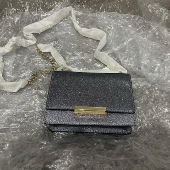 Kate Spade - Picture 1 of 4